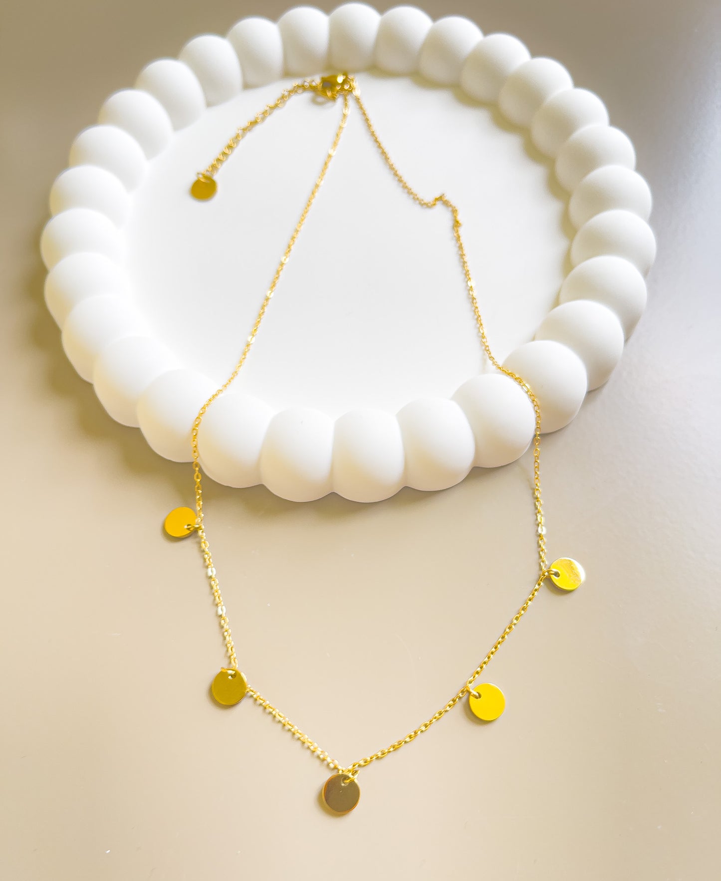COLLIER NUBIE ACIER OR